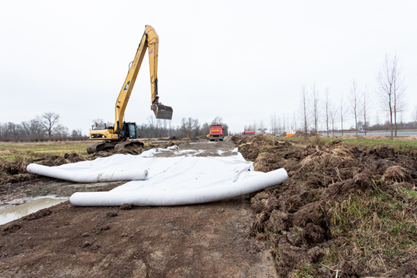 Tensar TriAx TenCate Polyfelt TS versterken bouwweg windmolenpark knooppunt Deil